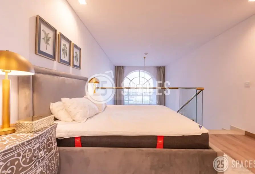 One-Bedroom Loft | Balcony with Garden View-7