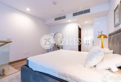 One-Bedroom Loft | Balcony with Garden View