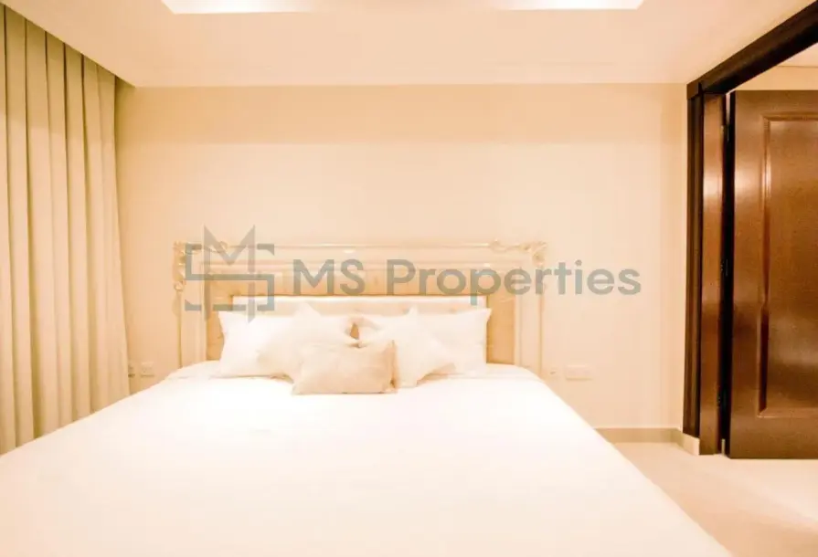 Elegant 2BR Townhouse with Spacious Balcony | Porto Arabia-4