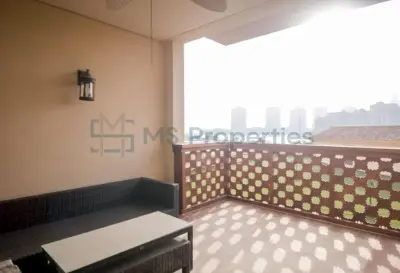 Elegant 2BR Townhouse with Spacious Balcony | Porto Arabia